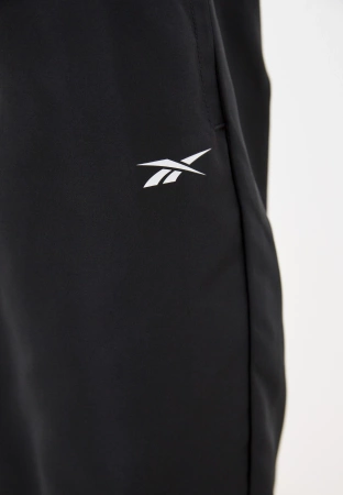 REEBOK - SPODNIE DRESOWE DAMSKIE - WOR WOVEN PANT GR9508