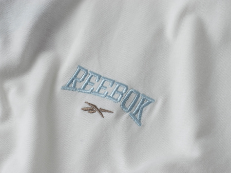 REEBOK - BLUZA DAMSKA CL VARSITY TOP HT7854