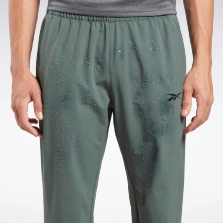 REEBOK - SPODNIE DRESOWE - WOVEN PANT HS5940