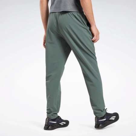 REEBOK - SPODNIE DRESOWE - WOVEN PANT HS5940